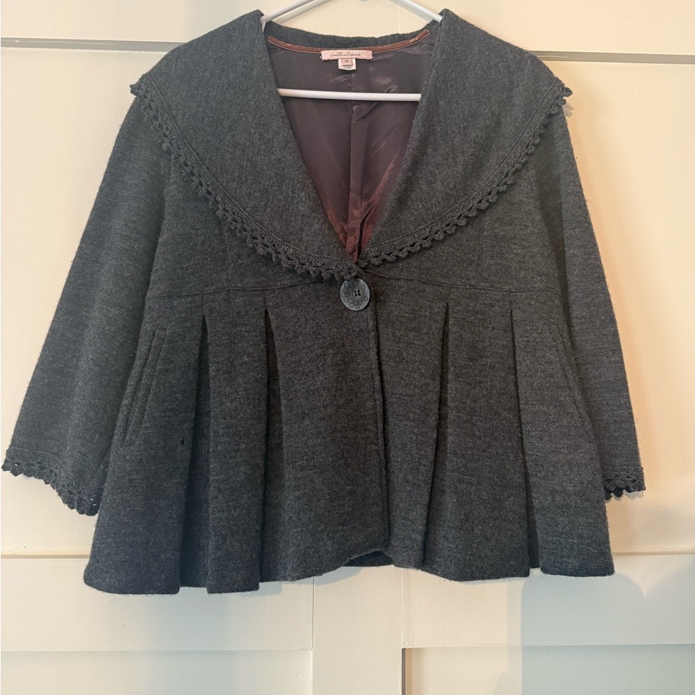 Gray flannel swing jacket.